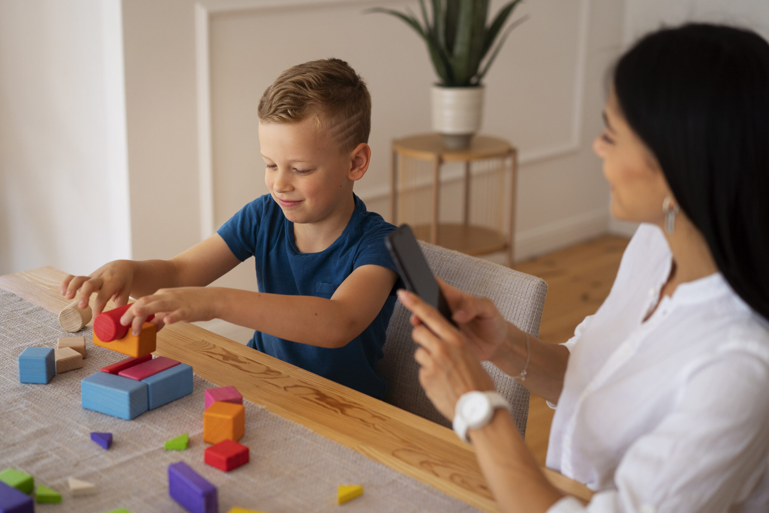 child with their mom playing brain teaser 3 scaled
