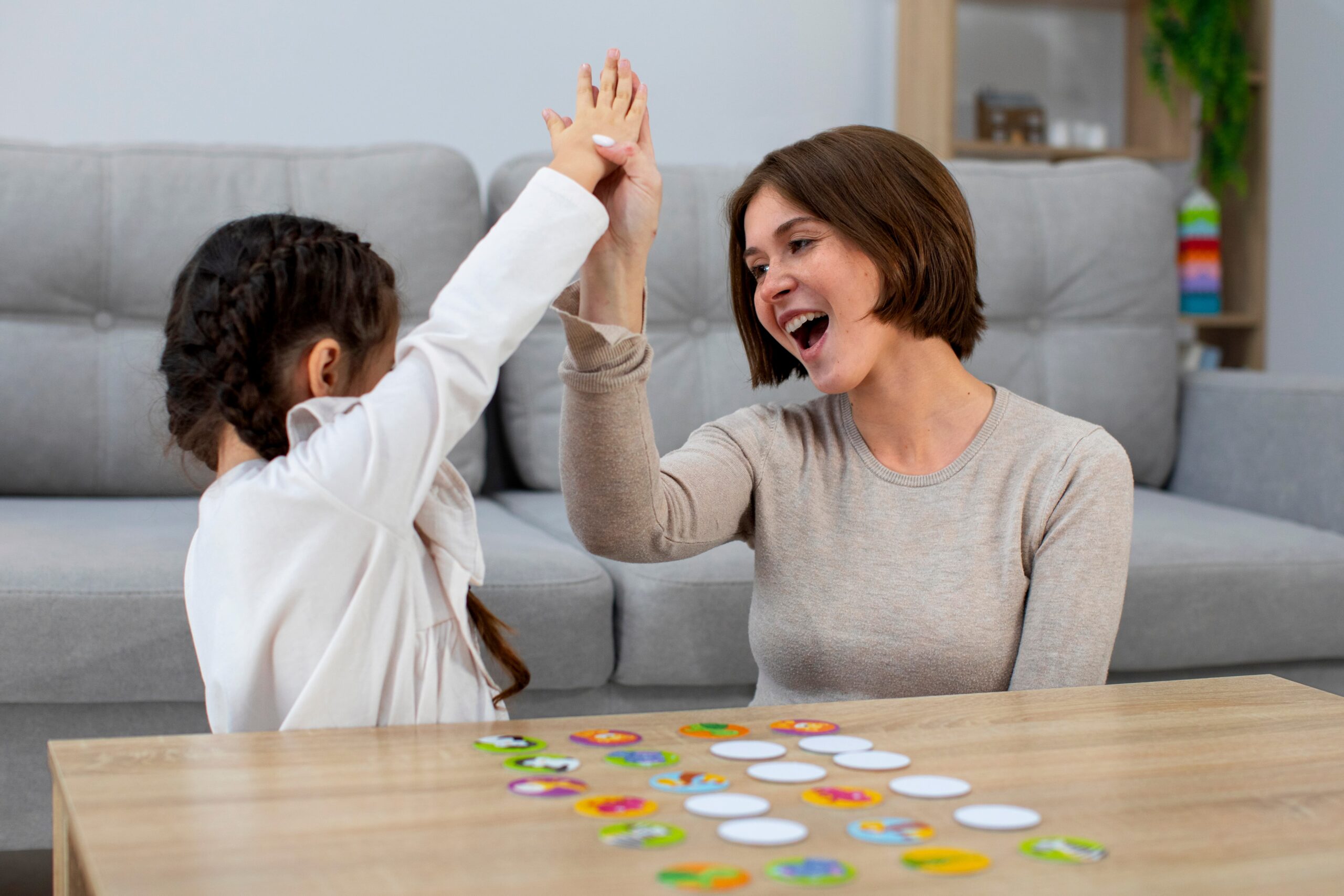 front view mother girl playing game 2 1 scaled